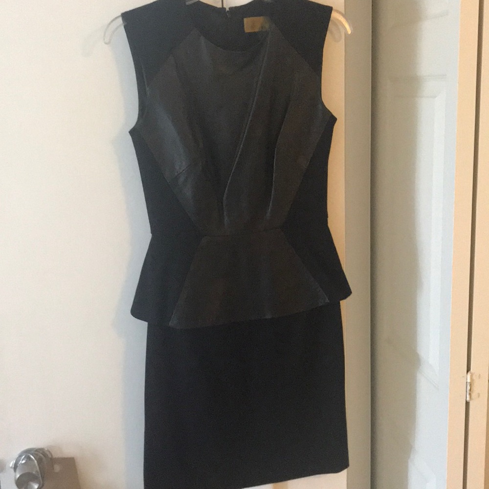 Black peplum Tina pointe nicole Miller dress